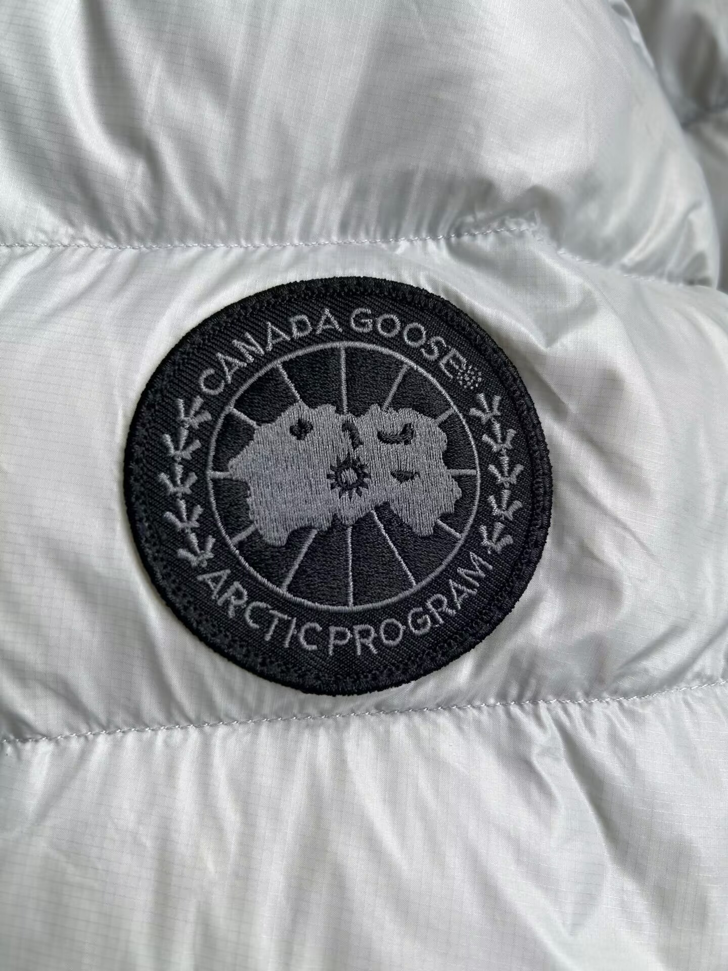 Can*a Go*e coat-261