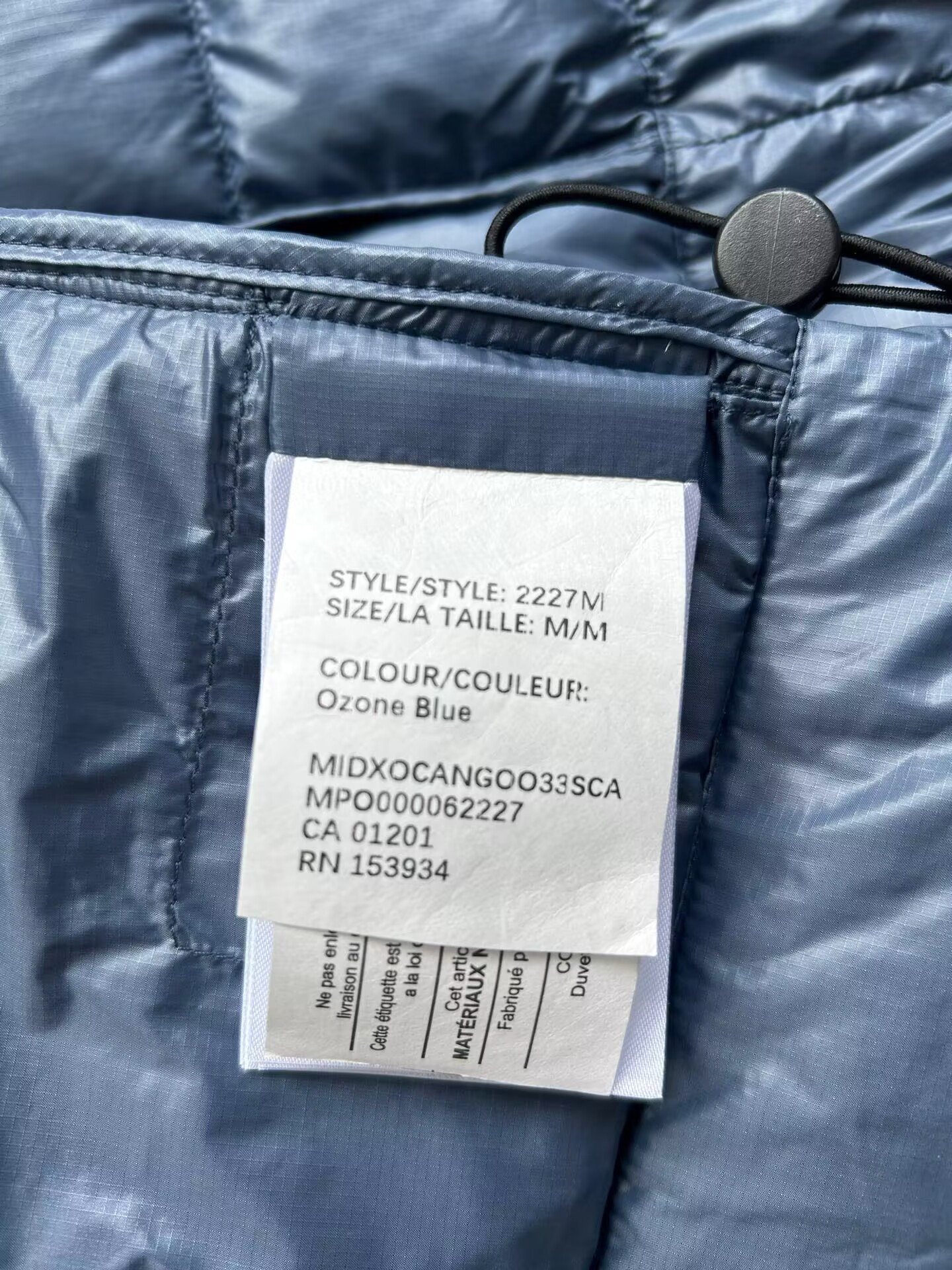 Can*a Go*e coat-260